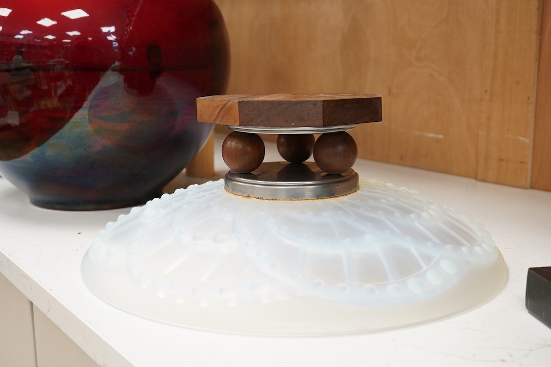 J Landier, a French Art Deco opalescent glass bowl on wooden pedestal base, 35cm in diameter